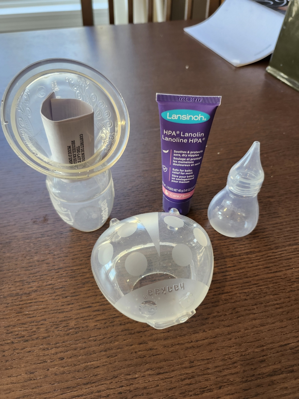 Haakaa Lot - Silicone Pump, Ladybug & Snot Sucker & Lansinoh Cream